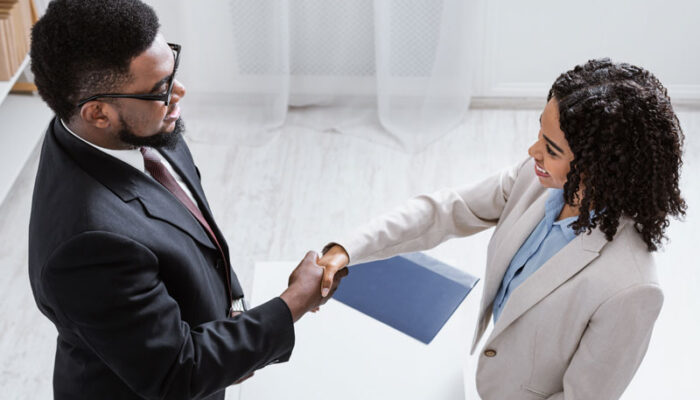 ridihuman-resources-manager-shaking-hands-with-success-2023-11-27-05-09-27-utc